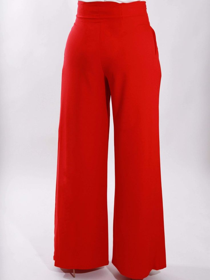 Being bold is the standard when you wear these fire palazzo pants. This piece embodies a fit and flare style that will turn heads immediately. Add definition to your outfit in an instant! High waisted, long pants with wide legs. Pockets are hidden in the side seams. These pants will make an elegant look with a silk blouse or bodysuit. Pair with our black bodysuit! Color: Red Inseam: 32" Hidden front zipper Made in USA 95% Rayon / 5% Spandex Available for pick up and is shipped out within 3 busin Cute Work Pants, Red Palazzo Pants, Women Pants, Work Wear Women, Fashion Story, Wide Legs, Palazzo Pants, Black Bodysuit, Work Pants