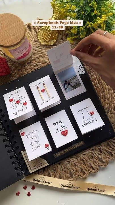 a table with some cards and pencils on top of it next to other items