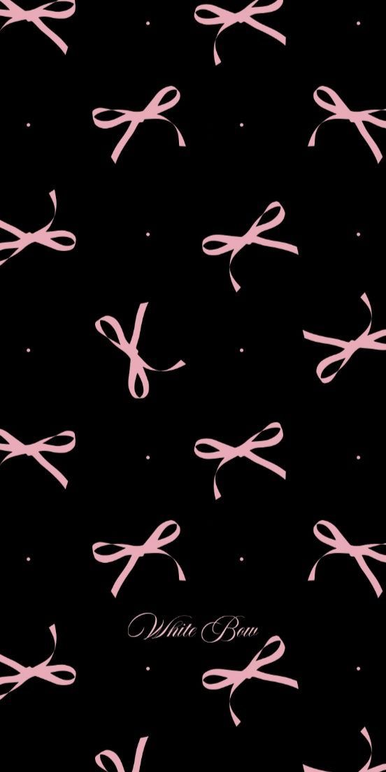 pink scissors on black background with stars