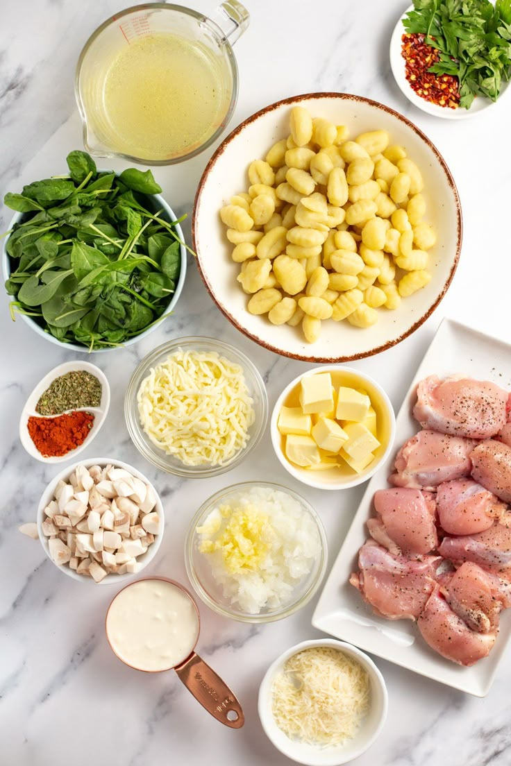 the ingredients for this dish include chicken, spinach, mushrooms, and other vegetables