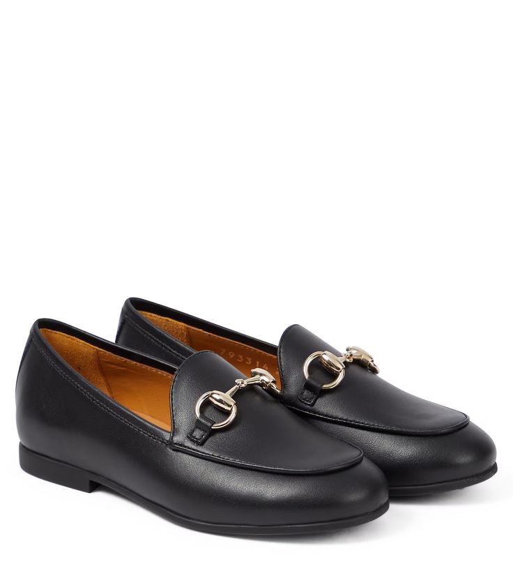 Horsebit leather loafers in black - Gucci Kids | Mytheresa Calf Leather Slip-ons With Textured Sole For Office, Luxury Leather Sole Slip-ons For Office, Luxury Round Toe Slip-ons For Work, Flat Calf Leather Loafers For Office, Luxury Leather Sole Slip-ons For Work, Luxury Slip-ons With Leather Sole For Work, Office Flat Calf Leather Loafers, Timeless Leather Slip-ons With Round Toe, Business Leather Lined Round Toe Loafers