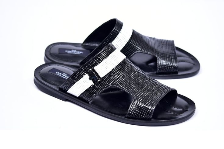 Elegant Leather Slippers For Summer, Elegant Black Leather Slippers, Elegant Black Open Toe Slippers, Classic Black Slippers For Summer, Classic Black Summer Slippers, Elegant Black Slippers For Spring, Elegant Slides With Leather Sole And Single Toe Strap, Luxury Slip-on Slippers For Spring, Luxury Slip-on Sandals With Textured Sole