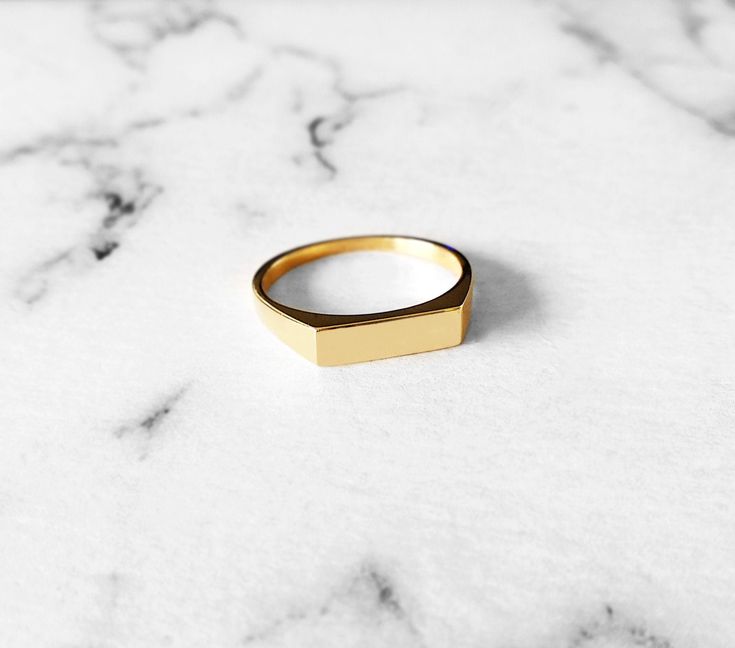 14K 18K Rectangular Chevalier ring, Solid Gold Signet ring, Gold Signet ring, Rose gold chevalier ring, Custom signet ring, Women Pinky ring, 9K signet ring, Custom personalized signet chevalier ring Trendy, yet classic chevalier/signet ring made in 18K, 14K or 9K solid gold. Customize your signet ring! Cutom Laser Engraving Service available here: https://www.etsy.com/listing/632275620 ------------------------------------------ R I N G S P E C S Rectangular: 11mmx3.5mm Band: Starting at the bot Minimalist 14k Gold Rectangular Signet Ring, Everyday Engraved Rectangular Ring, Modern Gold Rectangular Engraved Ring, Gold Rectangular Initial Ring Minimalist Style, Gold Rectangular Minimalist Initial Ring, Minimalist Gold Rectangular Ring, Minimalist Rectangular Gold Ring, Rectangular Initial Ring In Yellow Gold, Gold Minimalist Engraved Rectangular Ring