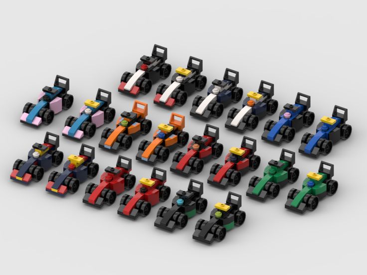 an assortment of lego race cars are arranged in the shape of a number of different colors and sizes