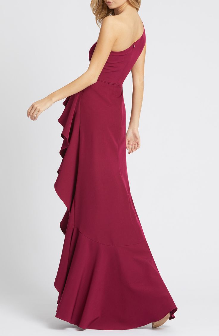 A daring asymmetrical hem that shows off your legs takes the sheath gown to this next level with a one-shoulder neck and a skirt that sweeps the floor. Style Name:Ieena For Mac Duggal One-Shoulder Ruffle Gown. Style Number: 6179092. Asymmetrical Maxi Dress With Ruched Bodice For Gala, Formal Strapless Floor-length Dress With Ruffles, Formal Floor-length Strapless Dress With Ruffles, Asymmetrical Ruffle Evening Dress For Wedding, Elegant Strapless Dress With Ruched Bodice And Asymmetrical Neckline, Asymmetrical Ruffled Evening Dress For Wedding, Asymmetrical Ruffled Wedding Evening Dress, Elegant One-shoulder Dress With Ruffles For Gala, One Shoulder Gown With Ruched Bodice For Cocktail