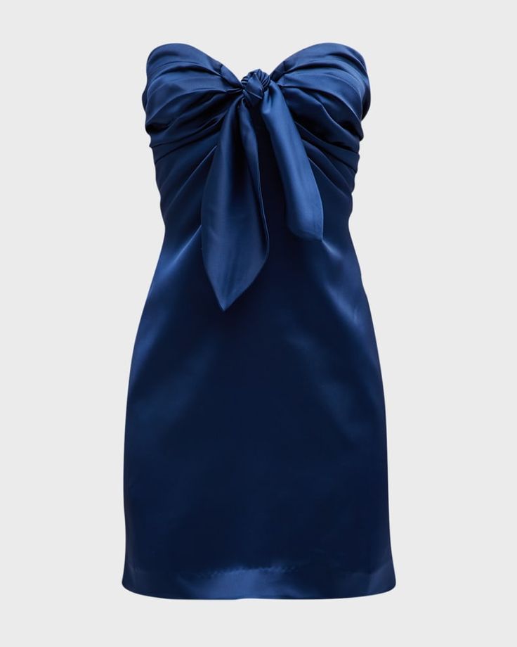 Crafted from high-quality satin, this strapless navy blue dress features a bodycon silhouette and a corset bodice with a tie-front, adding a touch of elegance and sophistication. The ruched details and zip-up back provide a flattering fit, keeping you comfortable and confident all day long. With a built-in bra for adde Short Blue Formal Dress, Strapless Blue Prom Dress, Homecoming Dresses Navy, Tight Short Dress, Dress Bow Tie, Hoco Inspo, Mini Homecoming Dress, Mermaid Siren, Mini Homecoming Dresses