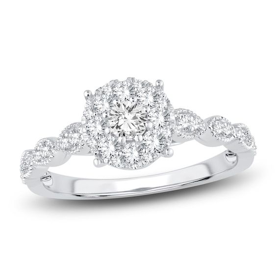 a white gold engagement ring with diamonds