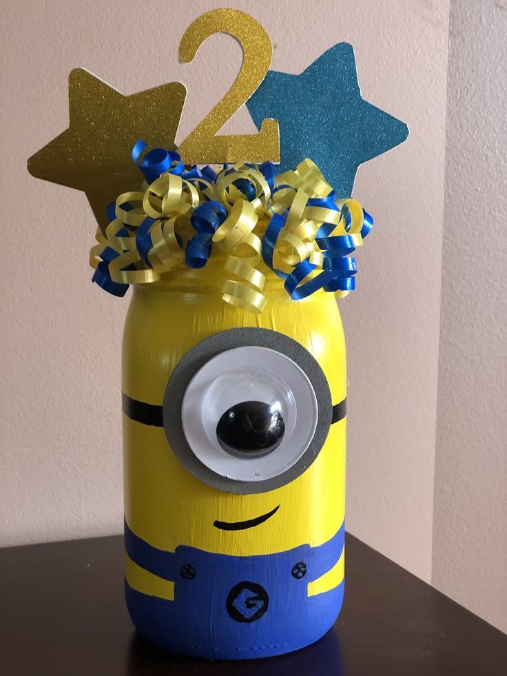 a yellow and blue mason jar with two stars on top, one for the number two