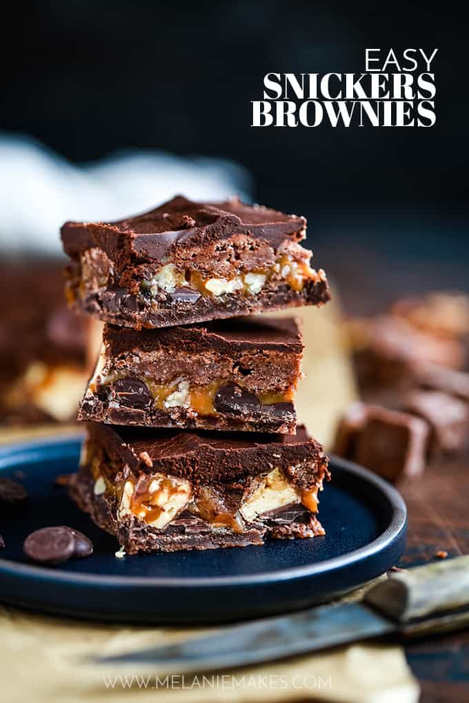 three chocolate brownies stacked on top of each other with the words easy snickkers brownies