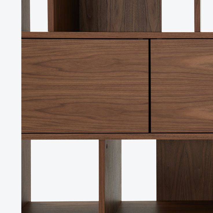 the sideboard is made out of wood and has two doors, one with an open drawer