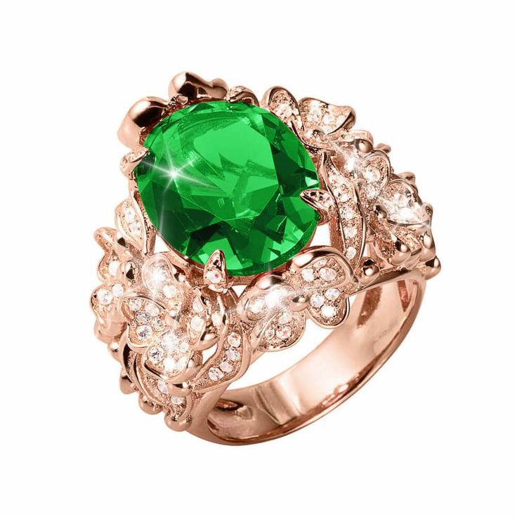 This stunning ring really does look as if it could have just been taken from a high end jewelry store. The setting in solid sterling silver, finished in rose gold helps enhance the luxurious feel and helps the stones shine in their own right. A floral bouquet surrounds and captures the stunning forest green center Diamondeau®, flawless simulated diamond. A real conversation piece. Elegant Rose Gold Emerald Ring For May Birthstone, Elegant May Birthstone Flower Ring With Gemstone, Elegant Rose Gold Oval Emerald Ring, Elegant Oval Rose Gold Emerald Ring, Luxury Rose Gold Emerald Ring For Formal Occasions, Formal Rose Gold Ring For May Birthstone, Rose Gold Luxury Emerald Ring For Formal Occasions, Elegant Flower Ring As Promise Ring With May Birthstone, Elegant Rose Gold Flower Ring With Halo Setting