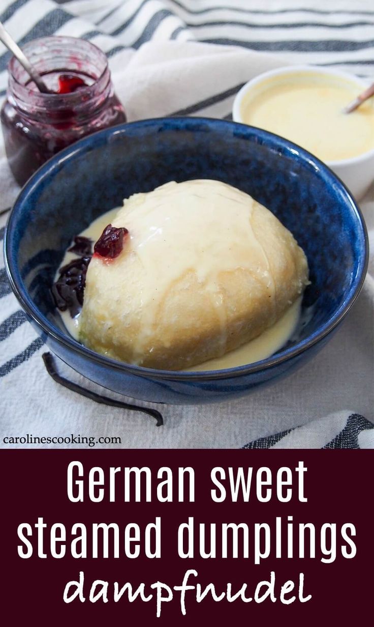 german sweet steamed dumplings with cranberry sauce in a blue bowl on a white and black striped tablecloth