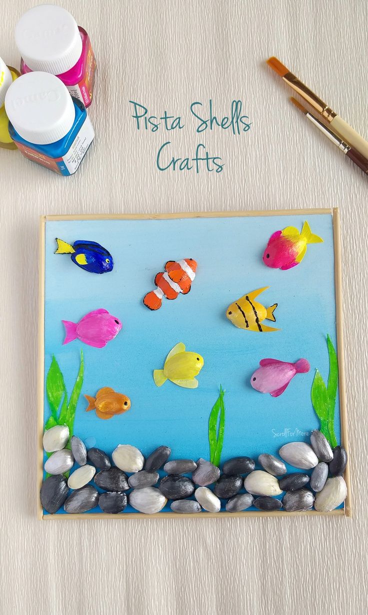 Made using Pista Shells and Sugar Apple seeds. Pista Shell Crafts, Aquarium Craft, Easy Art For Kids, Instruções Origami, Shell Crafts Diy, Hand Crafts For Kids, Diy Crafts Paper Flowers, Origami Crafts Diy, Diy Crafts For Kids Easy