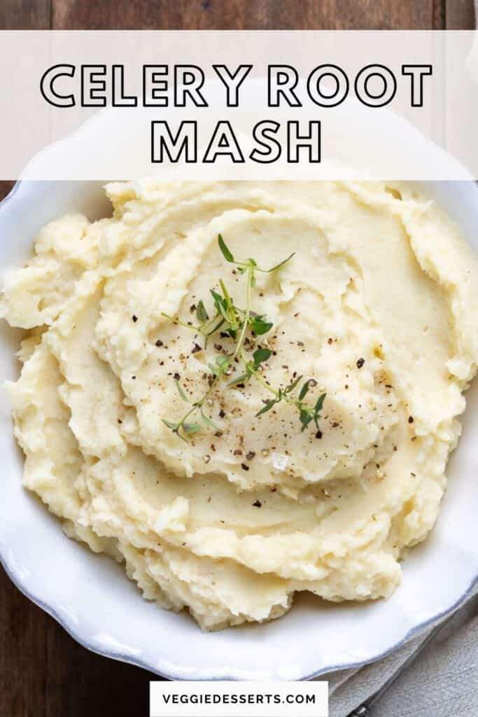 a bowl filled with mashed potatoes on top of a wooden table