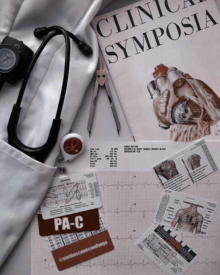 medical supplies are laid out on top of a white sheet with red and black writing