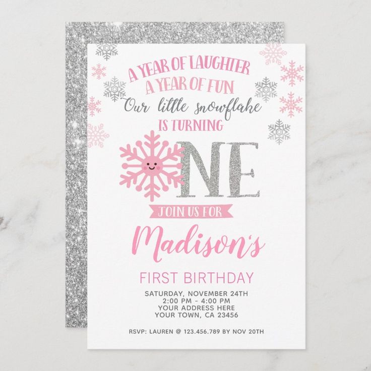 a pink and silver first birthday party card with snowflakes on the front,