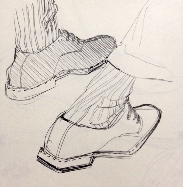 a drawing of two pairs of shoes sitting next to each other