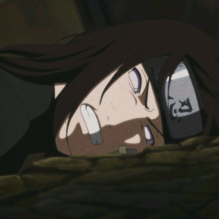 an anime character laying on the ground with her head down and eyes closed, staring at something in front of her