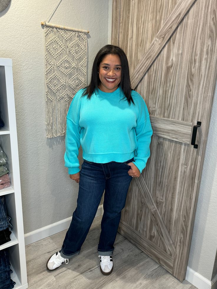 "Get cozy in style with this Aqua Blue Pullover Knit Mock Neck Sweater! Its cropped and oversized fit will keep you both warm and on-trend. Perfect for pairing with high-waisted jeans and boots for a relaxed yet chic look.(No itchy necks here!) Sizing is true to size, I'm in a size large for the perfect cozy feel. Blue Cropped Sweater With Ribbed Cuffs For Fall, Casual Solid Cropped Sweater For Fall, Casual Cozy Fit Cropped Sweater With Ribbed Cuffs, Casual Solid Color Cropped Sweater For Fall, Casual Cozy Fit Cropped Sweater For Fall, Casual Cropped Sweater With Relaxed Fit For Fall, Casual Solid Cropped Sweater With Ribbed Cuffs, Casual Relaxed Fit Cropped Sweater For Fall, Oversized Blue Cropped Sweater