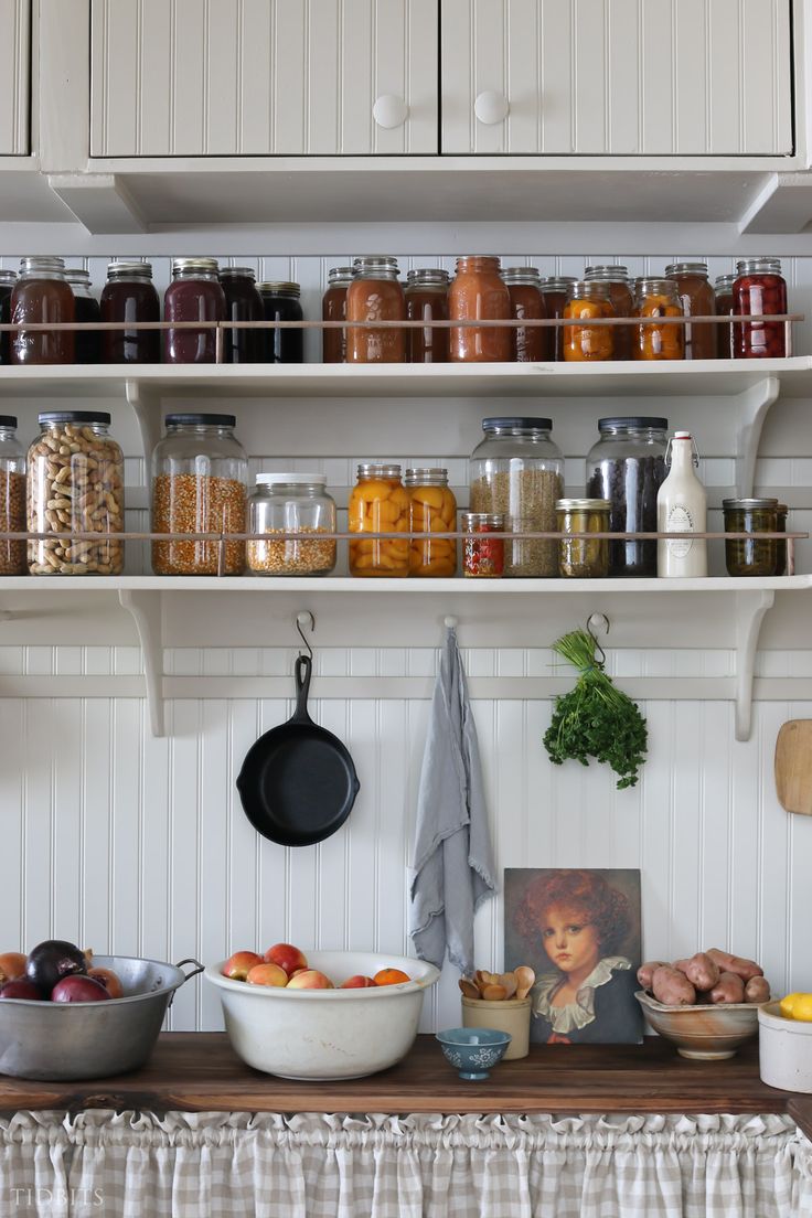 the kitchen is stocked with many different types of food