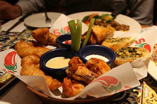 several plates of food are on the table