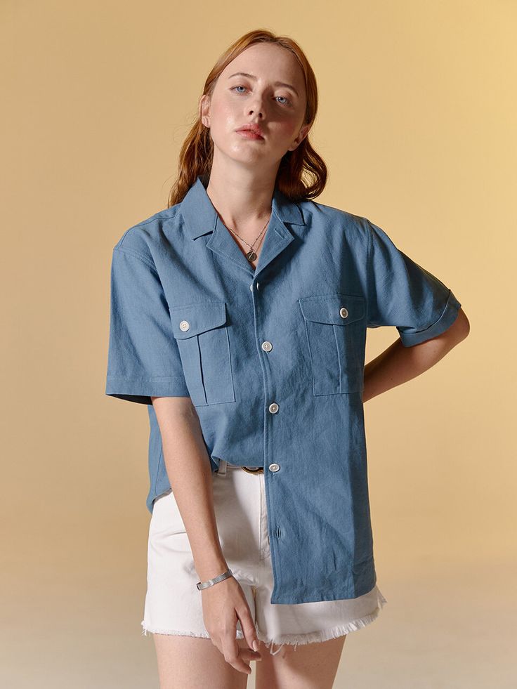 Editor's NotesSENTIBONES' shirt is made of linen blended material. Flap pocket details on the chest are the point of this shirt.- Button closure- Flap pockets on the chest- Open collar- Linen blended material- Versatile and unisex itemMeasurements(in.)2/3/4- Total length: 26.77 / 27.55 / 28.74 / 29.92 in.- Shoulder: 17.12 / 18.11 / 18.70 / 19.48 in.- Chest: 41.73 / 43.30 / 44.88 / 46.45 in.- Hem: 8.66 / 9.44 /9.84 / 10.23 in.Model infoMan - Height: 6'16 Fitting size 4Woman - Height: 5'47 Fitting size 2Composition & Care- 62% Linen, 38% Cotton- Please check the care labelDesigner- by SENTIBONES Classic Linen Shirt With Pockets, Spring Linen Shirt With Patch Pockets, Blue Button-up Top With Patch Pockets, Unstructured Summer Tops With Buttons, Unstructured Short Sleeve Shirt With Pockets, Classic Button-up Camp Shirt With Patch Pockets, Summer Button-up Short Sleeve Shirt With Patch Pockets, Casual Blue Tops With Flap Pockets, Linen Button-up Shirt With Welt Pockets