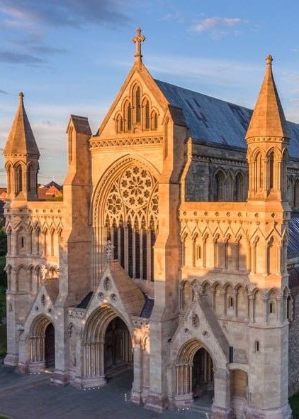 an aerial view of the cathedral at sunset