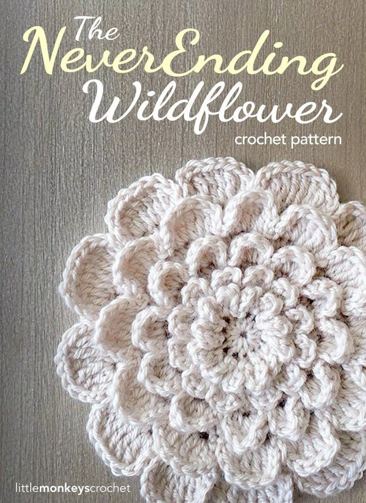 a crocheted flower is shown on the cover of an adult coloring book,