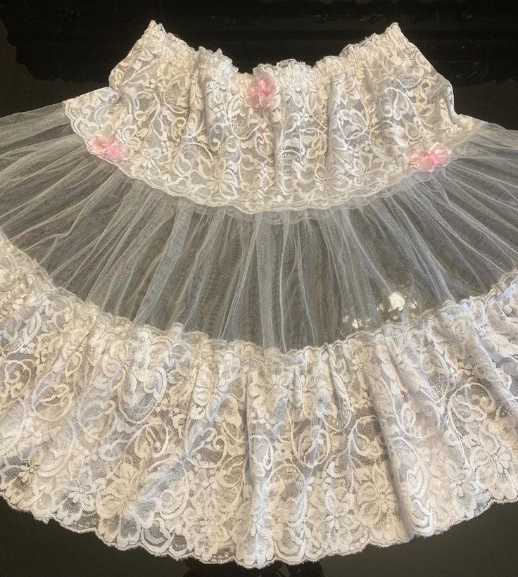 "Beautiful skirt, petticoat, underskirt ,  pure white soft lace and soft net material, very comfortable skirt, light weight  stretch elasticated waist band and finishing with tier of lace fabric and tier of net fabric and beautiful pink bows.  Waist size 26\" to 40\" inches  26\"-28\" inches (S) Length 16\" 30\"-32\" inches (M)Length 18\" 34\"-36\" inches (L) Length 20\" 38\"-40\" inches (XL) Length 22\"  Please check the waist size and the length before you order. please contact me if you have any problems with your Order  Thank you" White Ruffled Skirt Dresses, Skirted Party Dresses With Attached Cancan, White Tiered Skirt Dress With Attached Cancan, Stretch White Petticoat With Attached Cancan, White Stretch Dresses With Ruffled Skirt, White Ruffled Mini Skirt For Party, White Stretch Dress With Ruffled Skirt, White Ruffled Mini Skirt Dress, White Lined Skirt Dress For Party