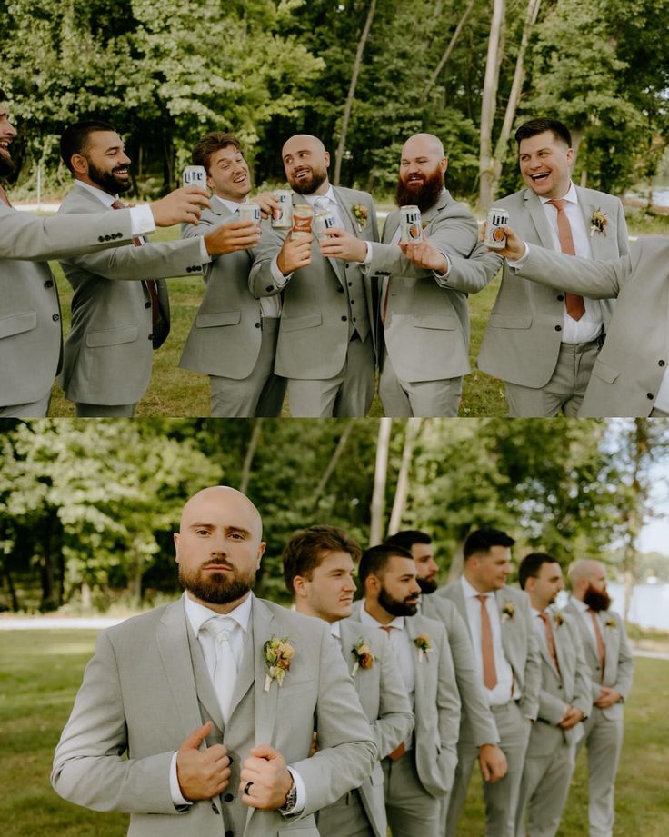 a group of men standing next to each other in front of trees and one man wearing a suit