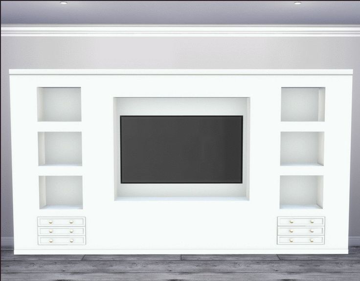 a white entertainment center with shelves and a flat screen tv mounted on it's wall