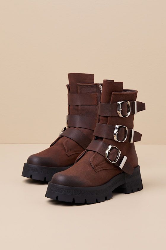 Lead the trend of stomp-worthy style with the Steve Madden Roland Brown Leather Buckle Moto Ankle Boots! Textured genuine leather (with subtle fading throughout) shapes a rounded upper and an ankle-high shaft with three, wide straps at the vamp that secure with oversized, silver buckles (featuring an organic-like design). A 6.5"" zipper at the instep makes for easy on-and-off, while a chunky lug heel completes the Moto-inspired look! 2. 25" rubber block heel. Lightly cushioned insole. Rubber sol Chunky Flat Boots, Boots With Straps, Ankle Boots Leather, Casual Formal Dresses, Nude Shoes, Closed Toe Shoes, Buckle Boots, The Vamp, Alt Fashion