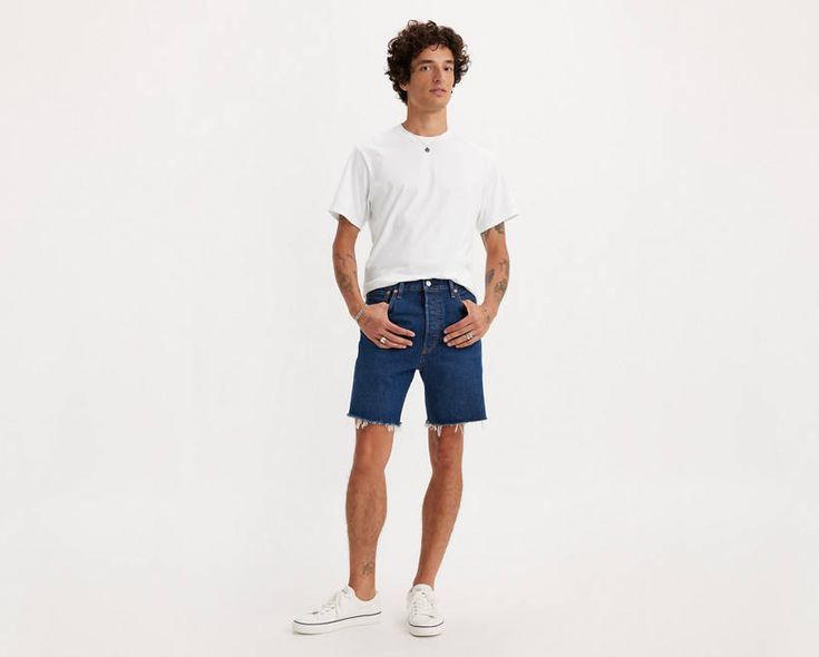 Nothing beats a pair of cut-offs when it's hot out. We took our vintage-inspired 501® ‘93 Straight jeans and reimagined them as these Cut-Off Shorts, so you don't have to do the work. You're welcome. Straight fitting cut-off shorts Classic '90s look and feel Crafted with non-stretch denim That perfect broken-in look;without putting in the work. This garment was distressed for an authentic vintage-inspired feel and lived-in style. Hold the H2O: This garment was made using recycled water, which he Levi's Streetwear Bottoms For Summer, Levi's Bottoms For Summer Streetwear, Levi's Summer Streetwear Jeans, Levi's Jeans For Summer Streetwear, Levi's Streetwear Shorts For Summer, Levi's Shorts For Summer Streetwear, Levi's Summer Streetwear Shorts, Live In Style, 90s Looks