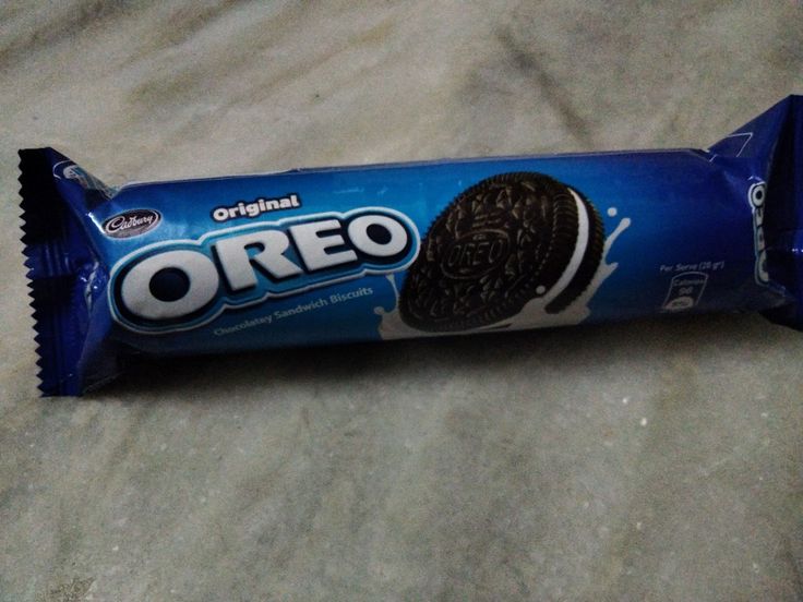 an oreo bar is laying on the ground