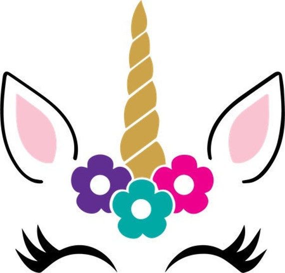 a unicorn's face with flowers in the center and a long horn on top