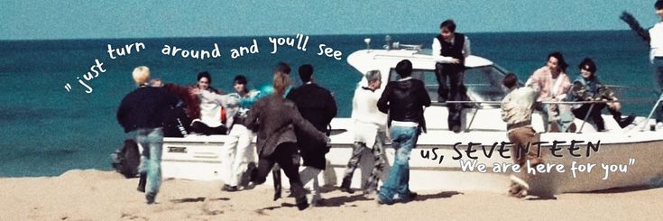 a group of people standing on the beach next to a small boat that says, i just found and you see we are here for you