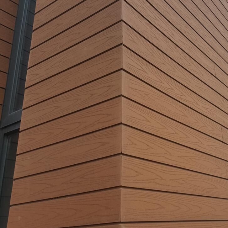 the side of a building with wood siding