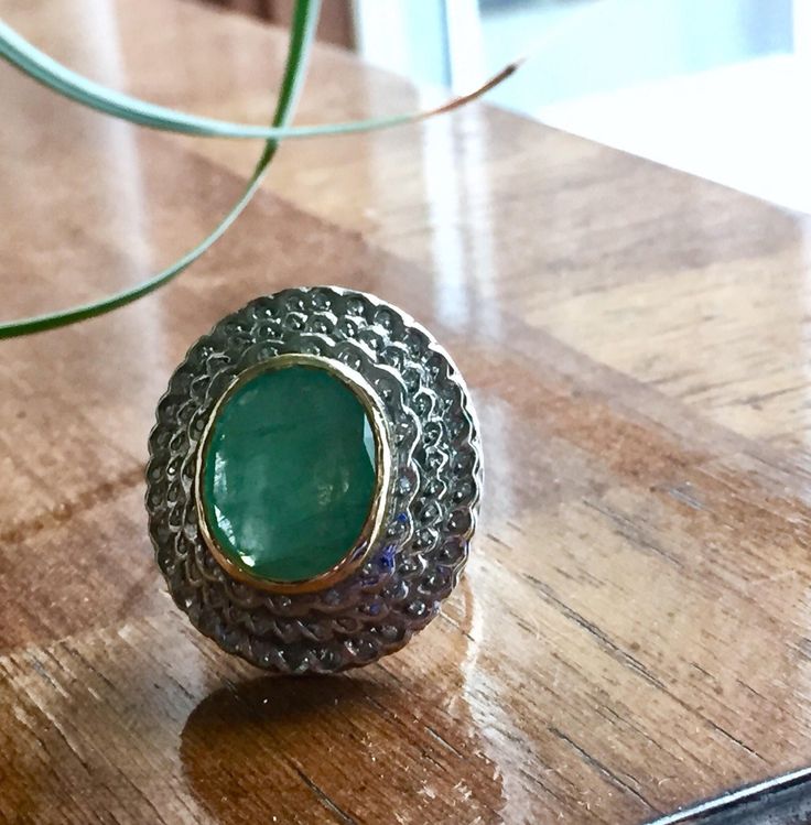 this ring is GORGEOUS!! you will love it! Really large Antique or vintage (looks like Victorian, but could be later) ring set with one big (approx 18x15mm -8-8.5CT by formula) Green Beryl - Emerald and natural old cut diamonds -3 rows! each approx 1.2-1.3mm. total carat weight of emerald and diamonds approx 9CTW+ it is hallmarked on the band 14k and made of solid yellow gold! also the bezel setting for the emerald made of solid 14k yellow gold. all of the diamonds set into solid 925 Silver (the Unique Oval Rings With Halo Setting, Vintage Emerald Cut Emerald Ring With Bezel Setting, Vintage Handmade Round Emerald Ring, Handmade Vintage Emerald Ring For Anniversary, Heirloom Emerald Ring With Rose Cut Diamonds, Vintage Handmade Emerald Anniversary Ring, Handmade Vintage Round Emerald Ring, Vintage Handmade Oval Emerald Ring, Handmade Vintage Oval Emerald Ring