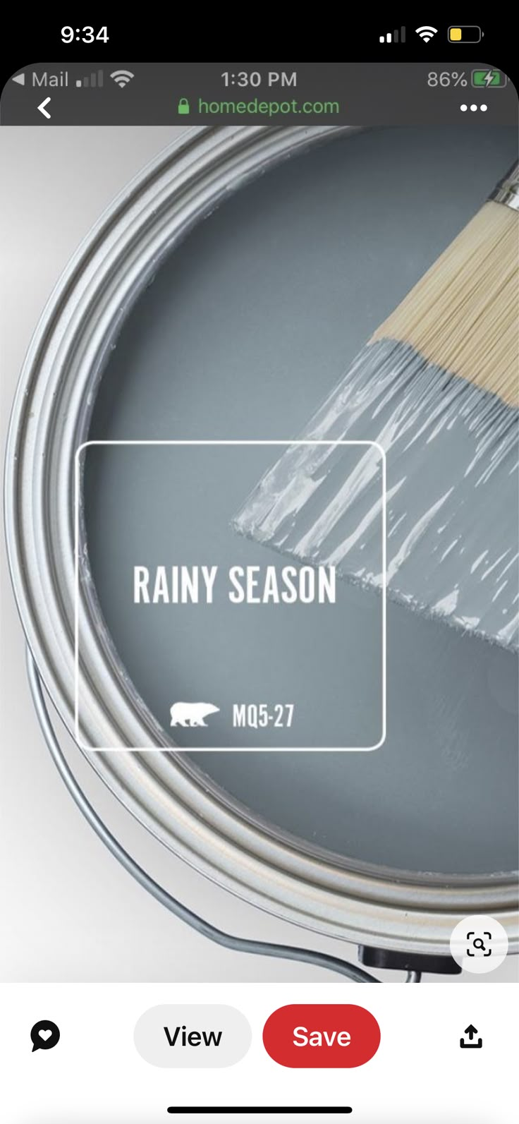 a paint can with a brush on top of it and the words rainy season