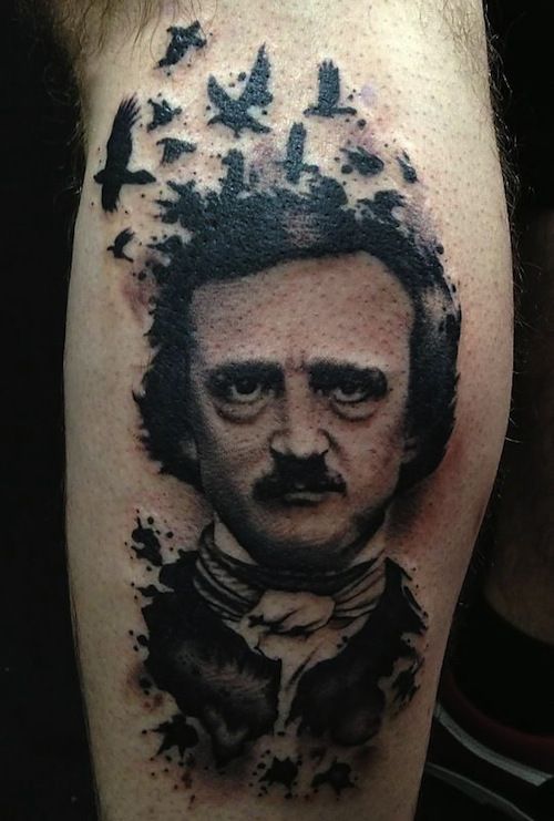 a man's arm with a portrait of abraham lincoln painted on it and ink splatters