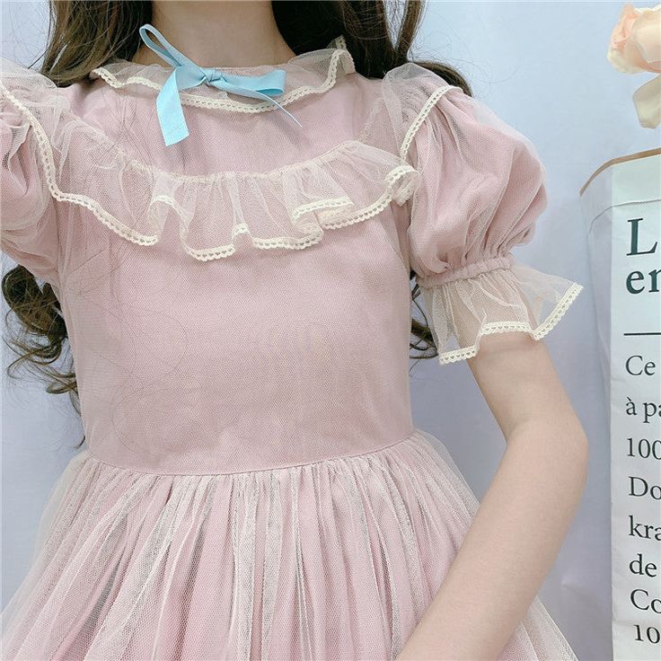 Feel like a cute princess in this Kawaii Ruffle Tulle Princess Dress! Size Chart: Size Bust (cm) Waist (cm) Shoulder (cm) Length (cm) Bust (in) Waist (in) Shoulder (in) Length (in) S 83 76 33 85 32.68 29.92 12.99 33.46 M 88 80 35 87 34.65 31.50 13.78 34.25 L 93 84 37 89 36.61 33.07 14.57 35.04 Description: Waistline: EmpireSleeve Style: Puff SleeveSleeve Length(cm): ShortSilhouette: A-LinePattern Type: SolidOrigin: CN(Origin)Neckline: O-NeckMaterial Composition: Synthetic FiberMaterial: Lace/Mes Pink Princesscore Fairy Dress For Spring, Summer Princesscore Dress With Lace Trim, Princesscore Dresses With Lace Trim For Spring, Spring Princesscore Dress With Lace Trim, Sweet Short Sleeve Princess Dress For Party, Kawaii Puff Sleeve Party Dresses, Sweet Summer Princess Dress With Ruffles, Sweet Ruffled Princess Dress For Summer, Spring Princesscore Short Sleeve Dress