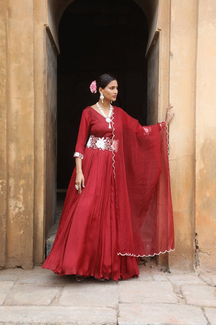 Featuring Maroon  silk anarkali with beads, dabka, mirror, zari work on sleeves paired with detachable belt and organza dupatta. Fabric - Silk, Organza Components - 3 Colour - Maroon Embroidery details - Hand Embroidery Delivery time - 2-3 weeks Washing Instructions - Dry-clean Anarkali Set With Sheer Dupatta In Chinon, Anarkali Floor-length Kundan Dupatta, Anarkali Choli With Sheer Dupatta In Chanderi, Anarkali Raw Silk Floor-length Palazzo Set, Floor-length Organza Palazzo Set With Cutdana, Floor-length Kundan Anarkali Set With Mirror Work, Floor-length Raw Silk Palazzo Set With Gota Work, Traditional Floor-length Chanderi Palazzo Set, Organza Anarkali Set With Cutdana