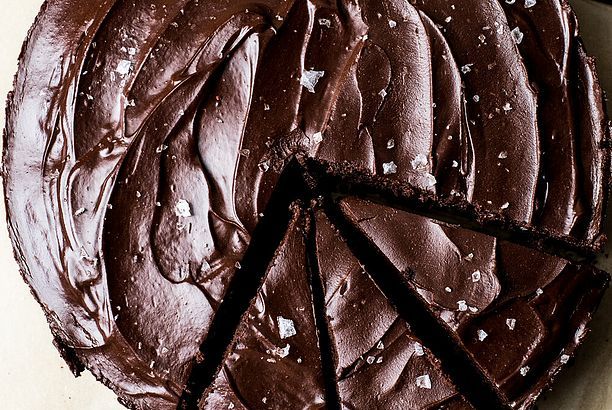 a chocolate cake that has been cut into slices