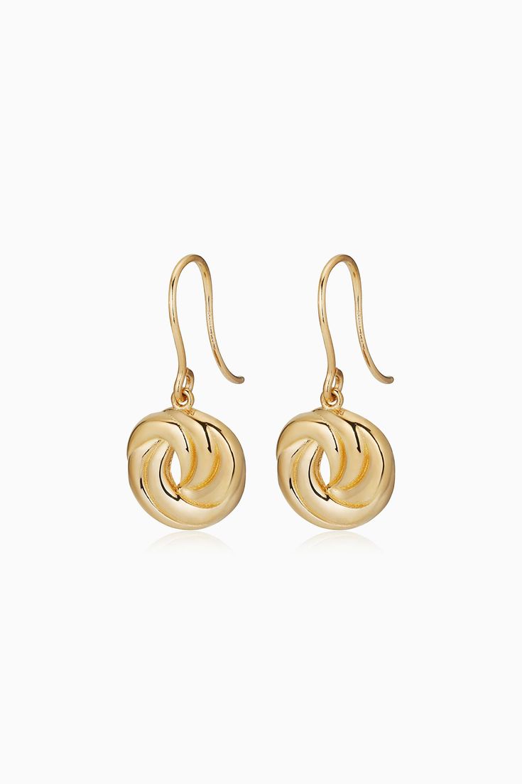 Indulge in the timeless elegance of our Infinite Love Drop Earrings. Crafted in Italy with 14k solid gold, these earrings feature a circular design with a twist, symbolizing eternal love and devotion. Measuring 13mm in length and 11mm in width, they offer a perfect balance of sophistication and charm, making them a versatile addition to any jewelry collection. Metal: 14 Karat Yellow Gold Dimensions: 12mm Diameter Weight: 1.9 Grams Origin: Crafted in Vicenza, Italy Refined Drop Earrings For Anniversary, Refined Sterling Silver Earrings For Gift, Timeless Yellow Gold Earrings With Elegant Design, Elegant 14k Gold Round Earrings, Refined 14k Yellow Gold Earrings, Refined 14k Gold Earrings As Gift, Elegant Earrings With Timeless Design As Gift, Refined 14k Gold Earrings For Gift, Refined 14k Gold Earrings For Anniversary