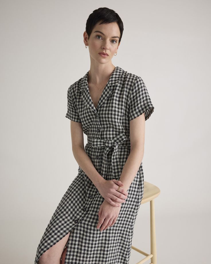 This midi linen dress should be in every wardrobe. Made from 100% organic linen and designed to be versatile, with elegant buttons down the front, and two pockets at the waist, and adjustable removable belt for the perfect fit.  | Quince | Women's Short Sleeve Dress in Khaki / Black Gingham, Size Large, Linen Casual Dresses With Button Closure For Picnic, Casual Gingham Midi Dress With Short Sleeves, Casual Dress With Button Closure For Picnic, Casual Dress With Button Closure For Picnics, Short Sleeve Gingham Dress For Work, Gingham Short Sleeve Dresses For Work, Short Sleeve Gingham Midi Dress For Day Out, Spring Short Sleeve Plaid Dress For Work, Spring Plaid Short Sleeve Dress For Work