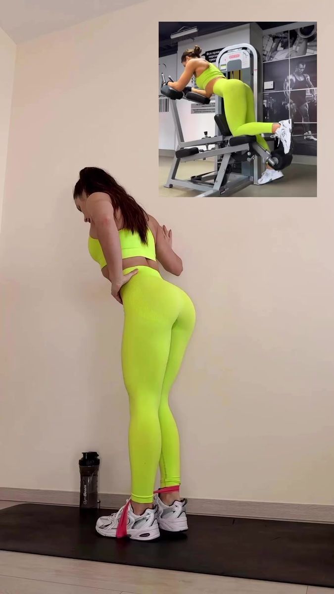 a woman in neon green tights is doing exercises