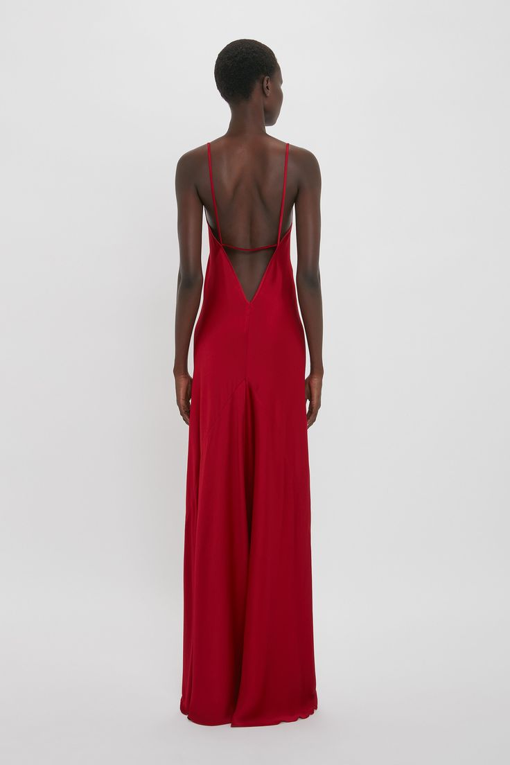 This 1990s-inspired camisole-slip dress has a bias cut for a flattering fit. A deep-V and scooped back create a sensuous silhouette, while delicate spaghetti strap detailing adds a sexy playfulness. With its floor-pooling hemline and confident shade of Poppy Red, it makes an assured statement. Victoria Beckham Low Back Cami Floor-Length Dress In Poppy Red  - Size 12 UK Red Silk Maxi Dress, Red Simple Dress, Long Red Dress Formal, Tailor Clothes, Prom Red Dress, Prom Dress Uk, Simple Formal Dresses, Simple Red Dress, Simple Formal Dress