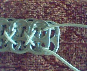 a close up view of a pair of shoes laces on the sole of someone's shoe