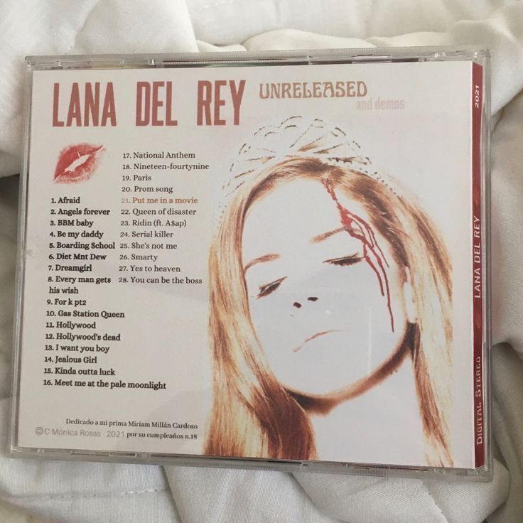 the cd cover for lana del rey unrecessed is lying on a white sheet