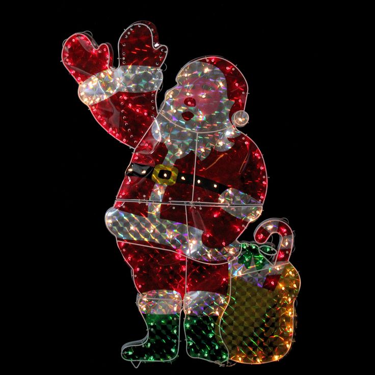 a lighted christmas decoration with a santa clause on it's chest and hands in the air